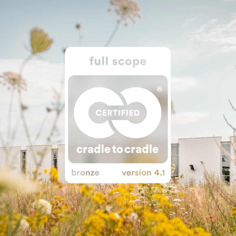The Cradle to Cradle Certified® Bronze Version 4.1 Logo superimposed onto the FSB Factory.
